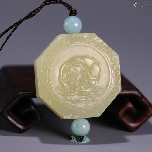 A Carved Jade Elephant Patterned Pendant