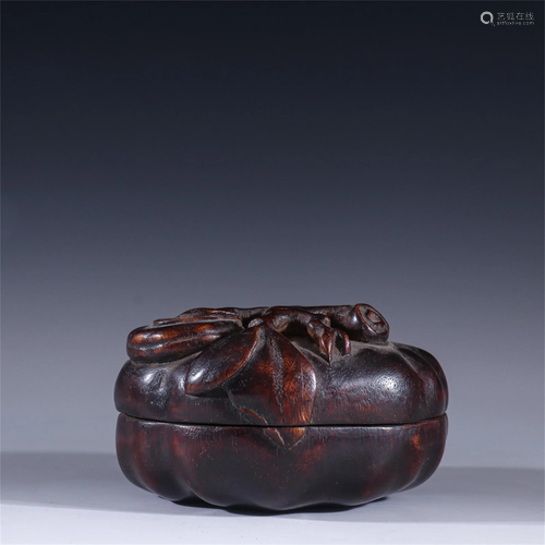 A Carved Agarwood Melon Shaped Container with Lid