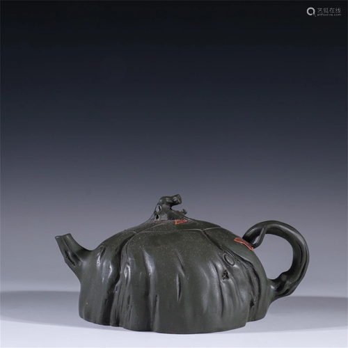 A Carved Yixing Zisha Teapot