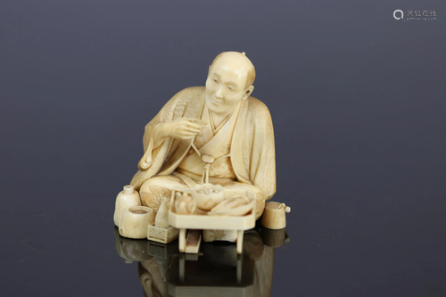 Japan Okimono carved of a character drinking tea Tokyo