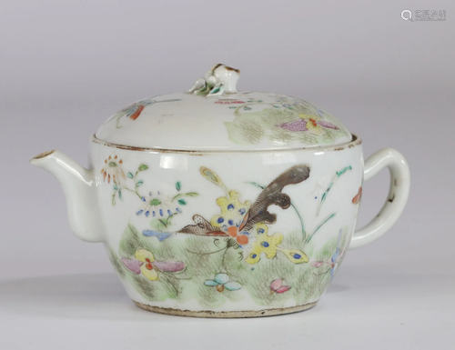 Porcelain teapot decorated with Chinese butterflies