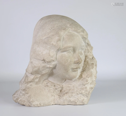 Head of a young woman 1900 in stone carved in French