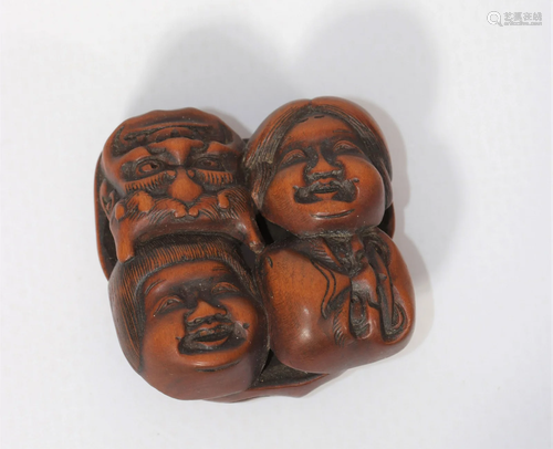 Japan wooden netsuke carved with 19th century masks