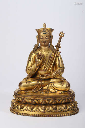 A Gilt Bronze Figure of Padmasambhava