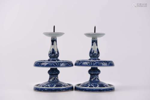 A Pair of Blue and White Candlesticks