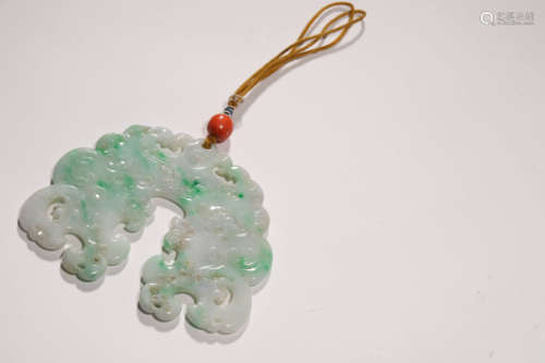 A Mottled Jadeite Pendant Qing