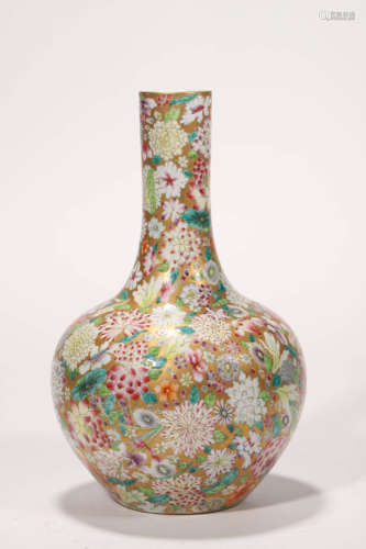 A Gilt-Ground Famille Rose Millefleurs Bottle Vase