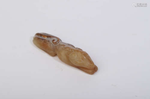 A Carved Russet Jade Hound