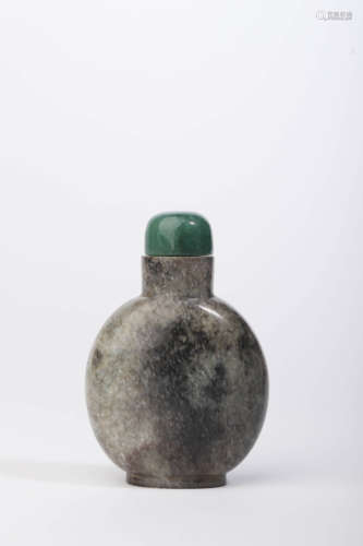 A Carved Grey and Black Jade Snuff Bottle