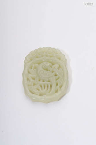 A Carved Jade Parrot Oval Pendant