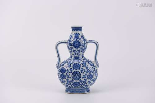 A Blue and White Buddhist Lotus Double-Gourd Shape Vase