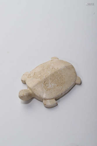 A Carved Chicken Bone White Jade Turtle Ornament