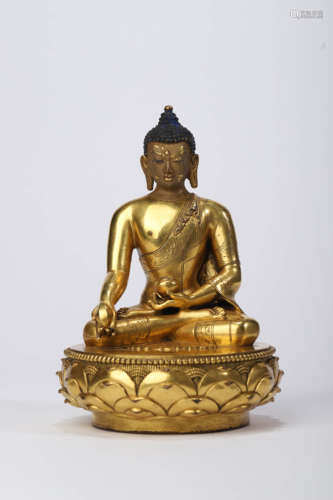 A Gilt Bronze Figure of Medicine Buddha