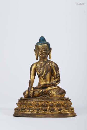 A Gilt Bronze Figure of Shakyamuni
