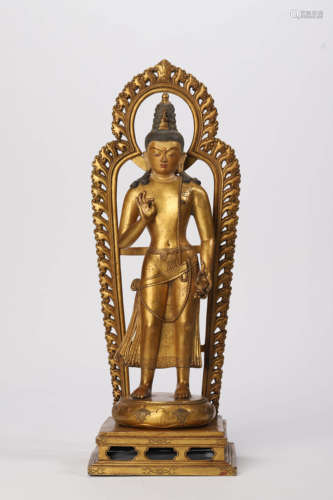 A Gilt Bronze Figure of Standing Shakyamuni