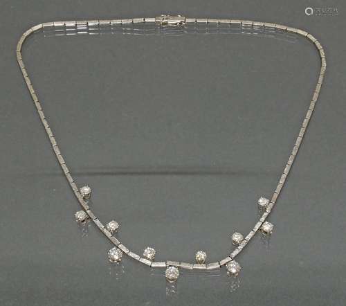 Collier, WG 750, 1 Brillant ca. 0.40 ct., 2 Brillanten zus. ...