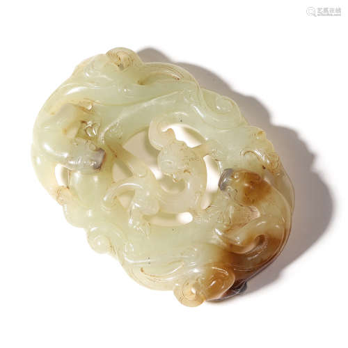 A BROWNISH AND WHITE JADE DRAGON PENDANT