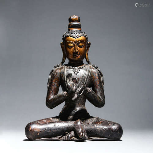 A BRONZE FIGURE OF AVALOKITESVARA