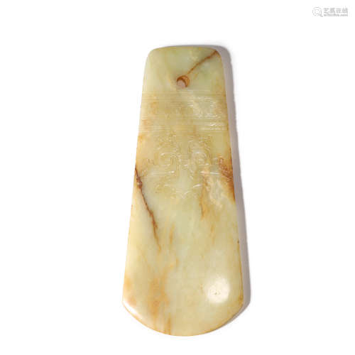 A BROWNISH AND RUSSET JADE ORNAMENT