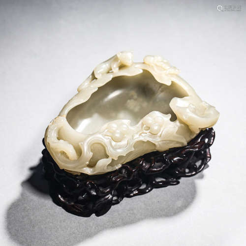 A CARVED JADE DRAGON WASHER