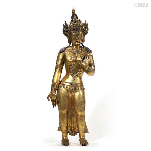 A STANDING GILT BRONZE AVALOKITESVARA