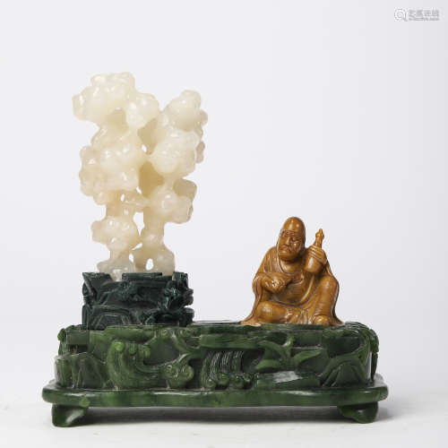A CARVED JADE AND STONE BOULDER ORNAMENT