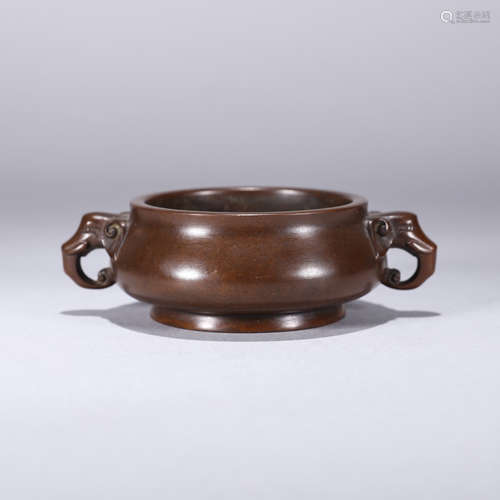 A BRONZE FOUR-LEG CENSER