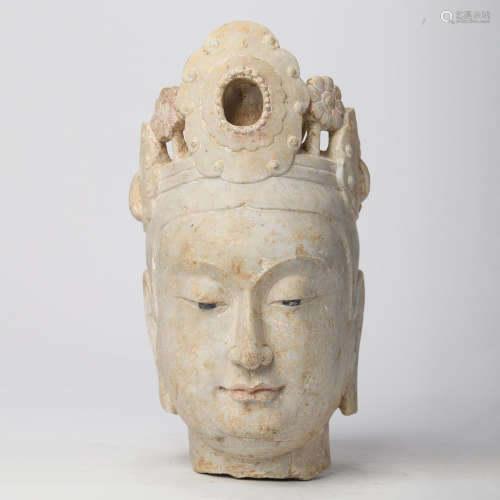 A CHINESE CARVED STONE HEAD OF GUANYIN