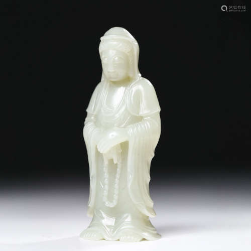 A CARVED JADE FIGURE OF GUANYIN