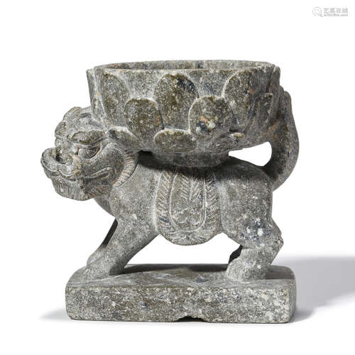 A CHINESE CARVED GREY STONE ORNAMENT