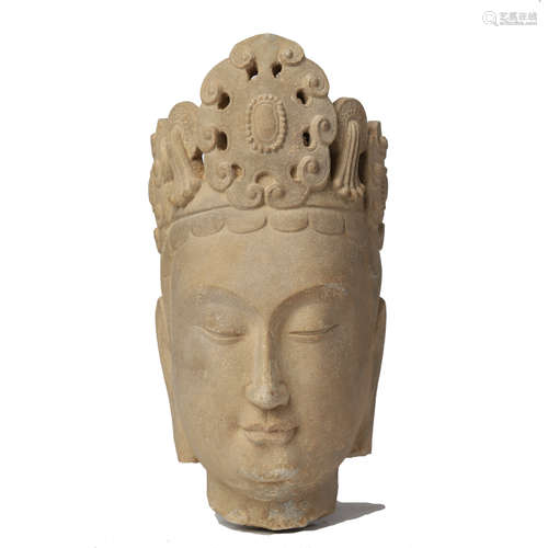 A CHINESE CARVED STONE HEAD OF BUDDHA