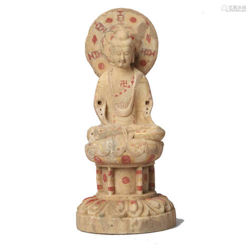 A CHINESE CARVED STONE FIGURE OF BUDDHA