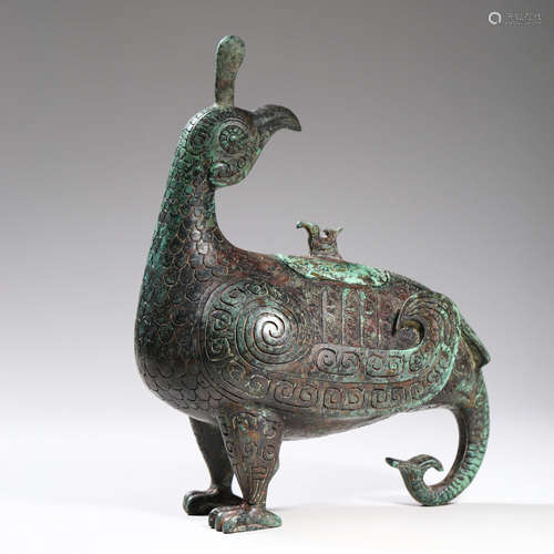 A BRONZE RITUAL BIRD-FORM ZUN