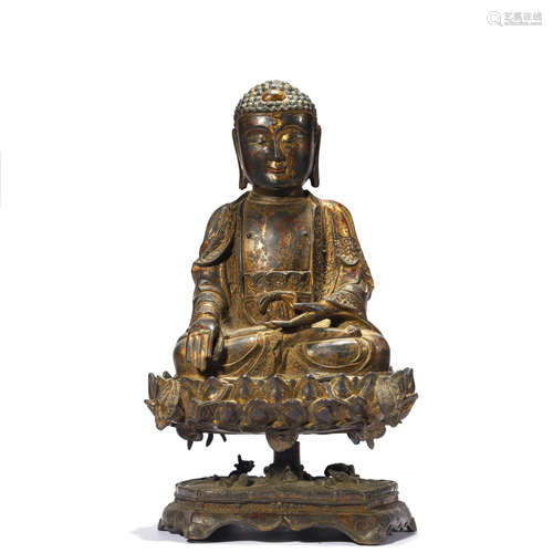 A GILT BRONZE FIGURE SHAKYAMUNI