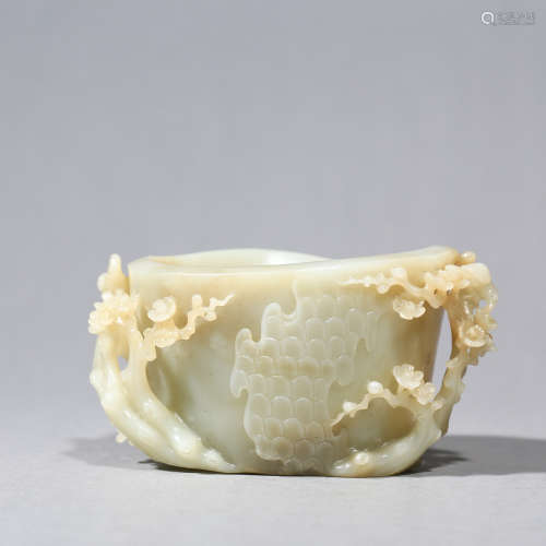A CARVED JADE PLUM BLOSSOM WASHER