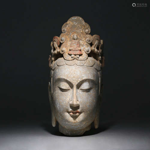 A CARVED BUDDHA HEAD