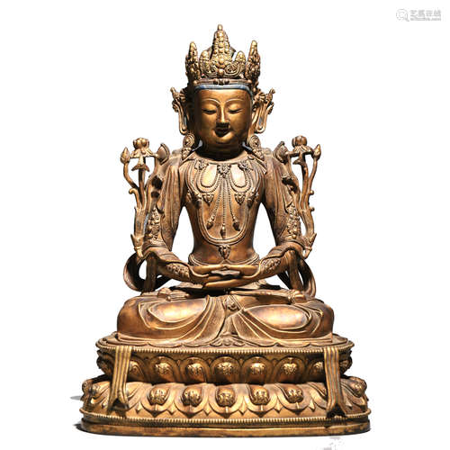 A GILT BRONZE FIGURE OF AVALOKITESVARA