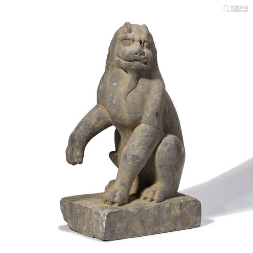 A CHINESE CARVED STONE BEAST