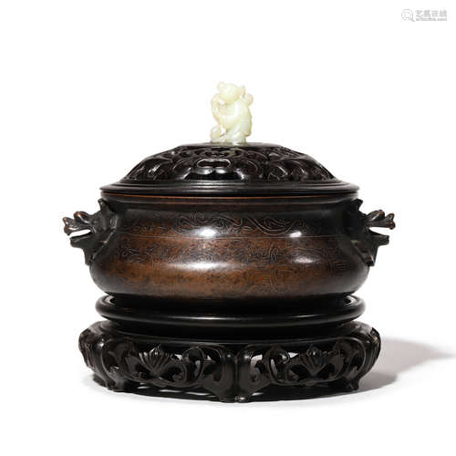 A BRONZE DRAGON AND CLOUD INCENSE BURNER