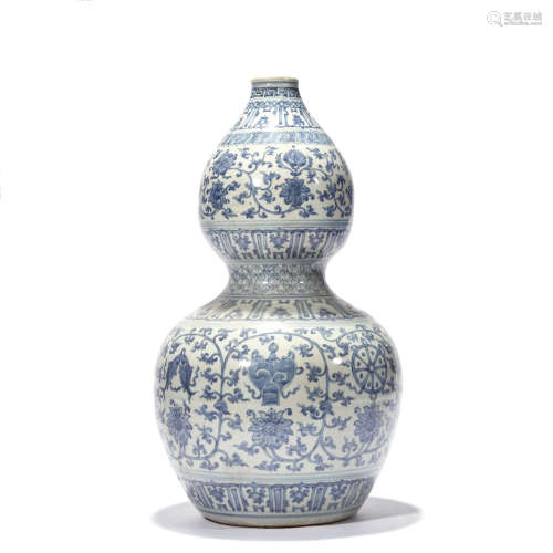 A BLUE AND WHITE LOTUS DOUBLE-GOURD VASE