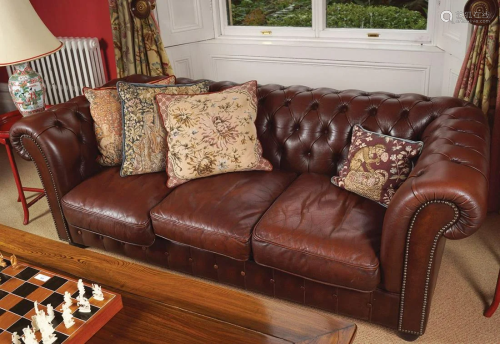 DEEP BUTTONED HIDE UPHOLSTERED ROLL BACK SETTEE
