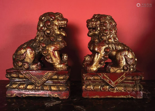 PAIR CHINESE CARVED LACQUERED AND GILDED FOO DOGS