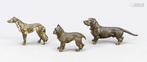 Set of four small dog sculptur