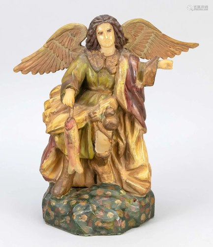 Figure of an angel with a fish