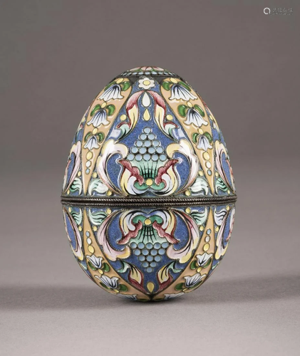 AN EGG-SHAPED SILVER-GILT AND CLOISONNÃ‰ ENAMEL BOX