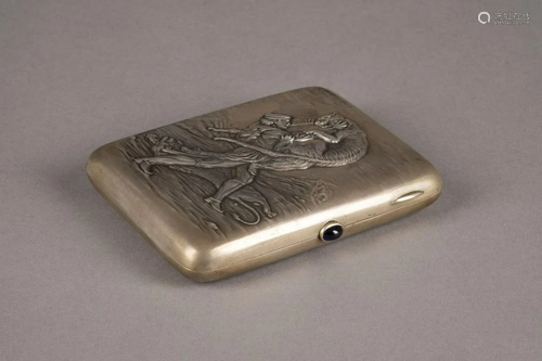 A SILVER CIGARETTE CASE SHOWING THE FIGHT WITH LIONS