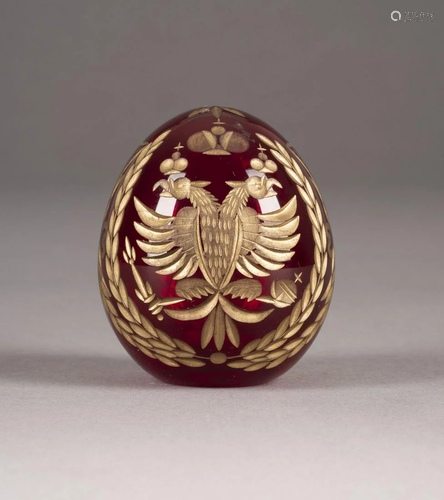 A GLASS EASTER EGG WITH DOUBLE-HEADED EAGLE AND