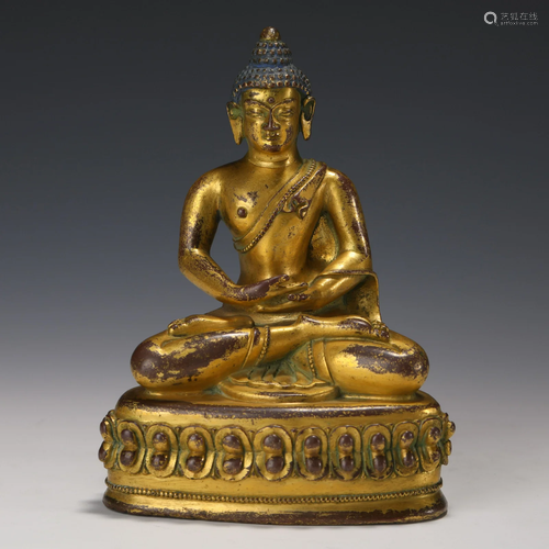 A Tibetan Bronze Gilt Amitabha