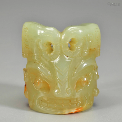 A Carved Celadon Jade Archer Ring Shang Dynasty