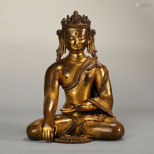 A Tibetan Bronze Gilt Crowned Buddha